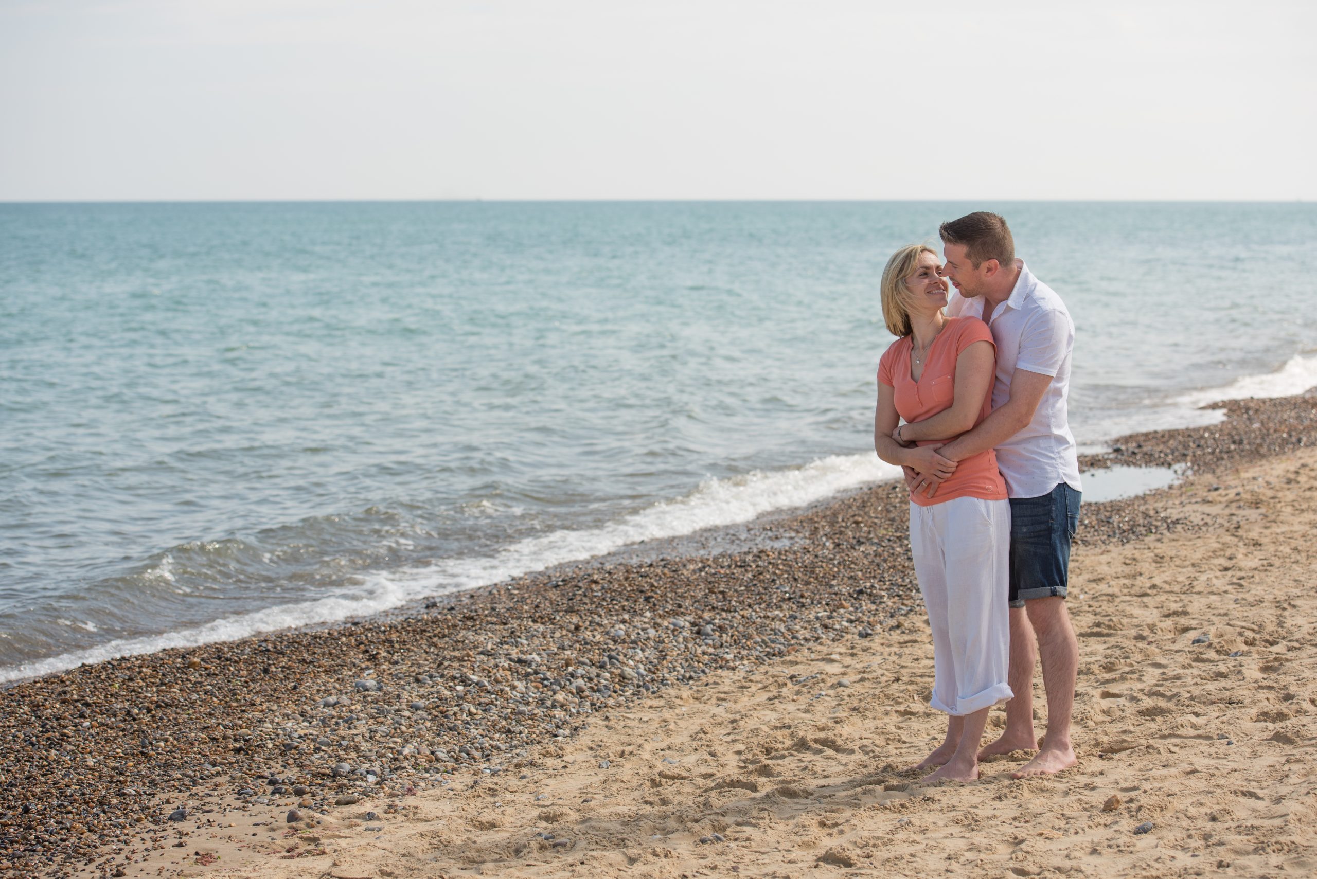 couple in love on norfolk beach during photography session in norfolk
